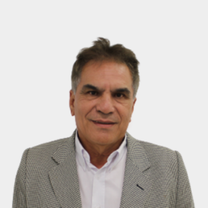 Professor Alberto David Pertuz Comas of the School of Mechanical Engineering, UIS, is presented to the general public and the educational community. The photo was taken in close-up, with a white background, and the professor is positioned in the center.