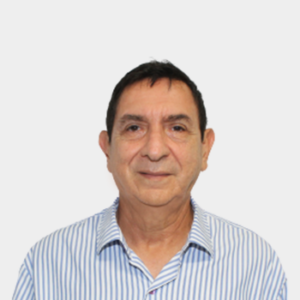 Professor Manuel Guillermo Flórez Becerra of the School of Systems Engineering and Computer Science, UIS, is presented to the general public and the educational community. The photo was taken in close-up, with a white background, and the professor is positioned in the center.