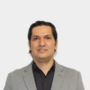 Professor Gabriel Rodrigo Pedraza Ferreira of the School of Systems Engineering and Computer Science, UIS, is presented to the general public and the educational community. The photo was taken in close-up, with a white background, and the professor is positioned in the center.