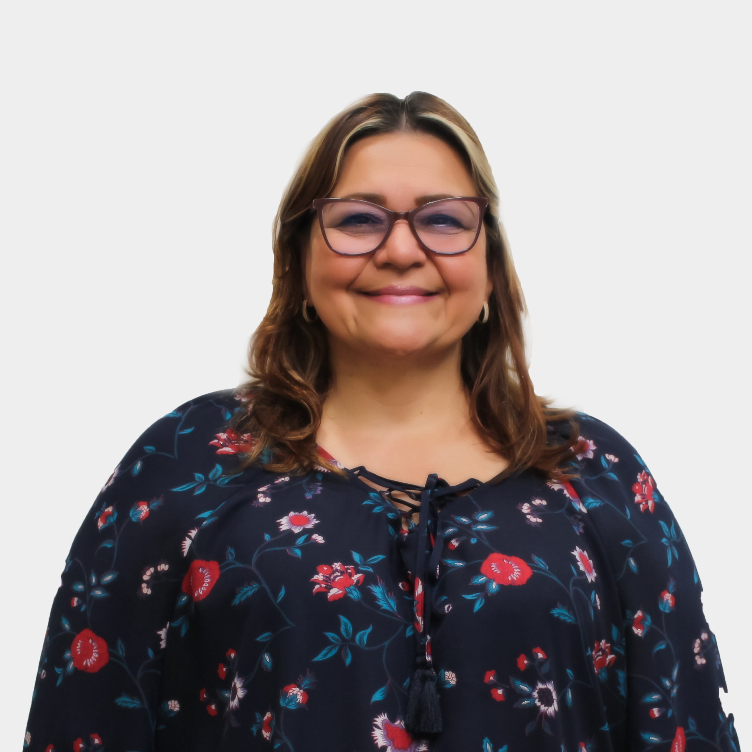 The professor of the School of Social Work, Martha Ligia Peña Villamizar, is presented to the general public and the educational community. The photo was taken in close-up, with a white background, and the professor is positioned in the center.