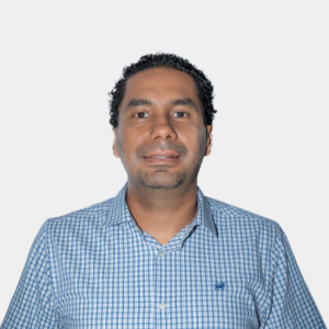 The photo was taken in the foreground, white background and the teacher Guillermo Diaz is located in the centre.