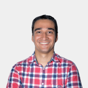 The photo was taken in the foreground, white background and the teacher Jose Luis Herrera Celis is located in the centre.
