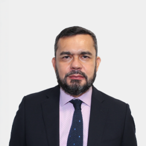 The photo was taken in the foreground, white background and the teacher Alvaro Acevedo Tarazona is located in the centre.