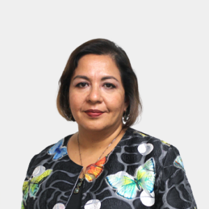 Aura Cecilia Pedraza Avella, professor of the School of Industrial and Business Studies, is introduced to the general public and the educational community. PhD in Economics. The photo was taken in the foreground, white background and the professor is located in the center.