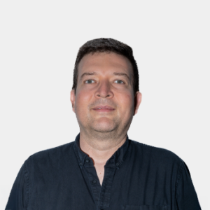 The photo was taken in the foreground, white background and the teacher Jorge Francisco Maldonado is located in the centre.