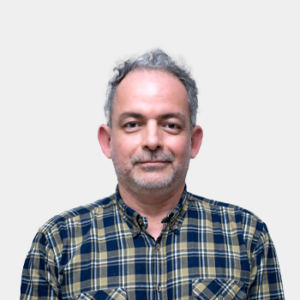 The photo was taken in the foreground, white background and the teacher Valsak Rojas Torres is located in the centre.